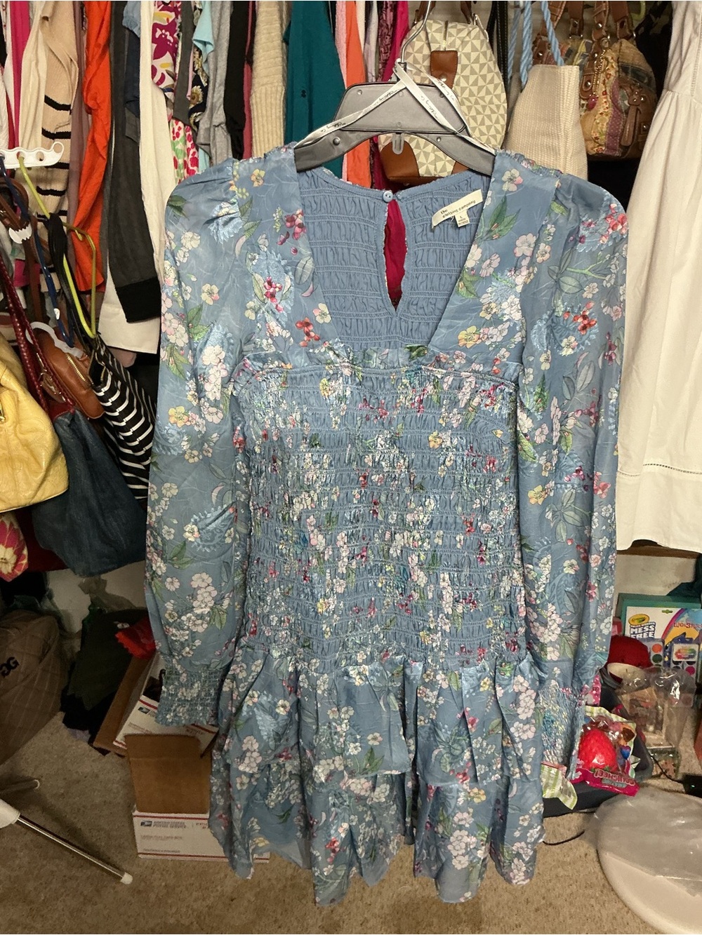 the clothing company Blue Floral Smocked Mini Dress